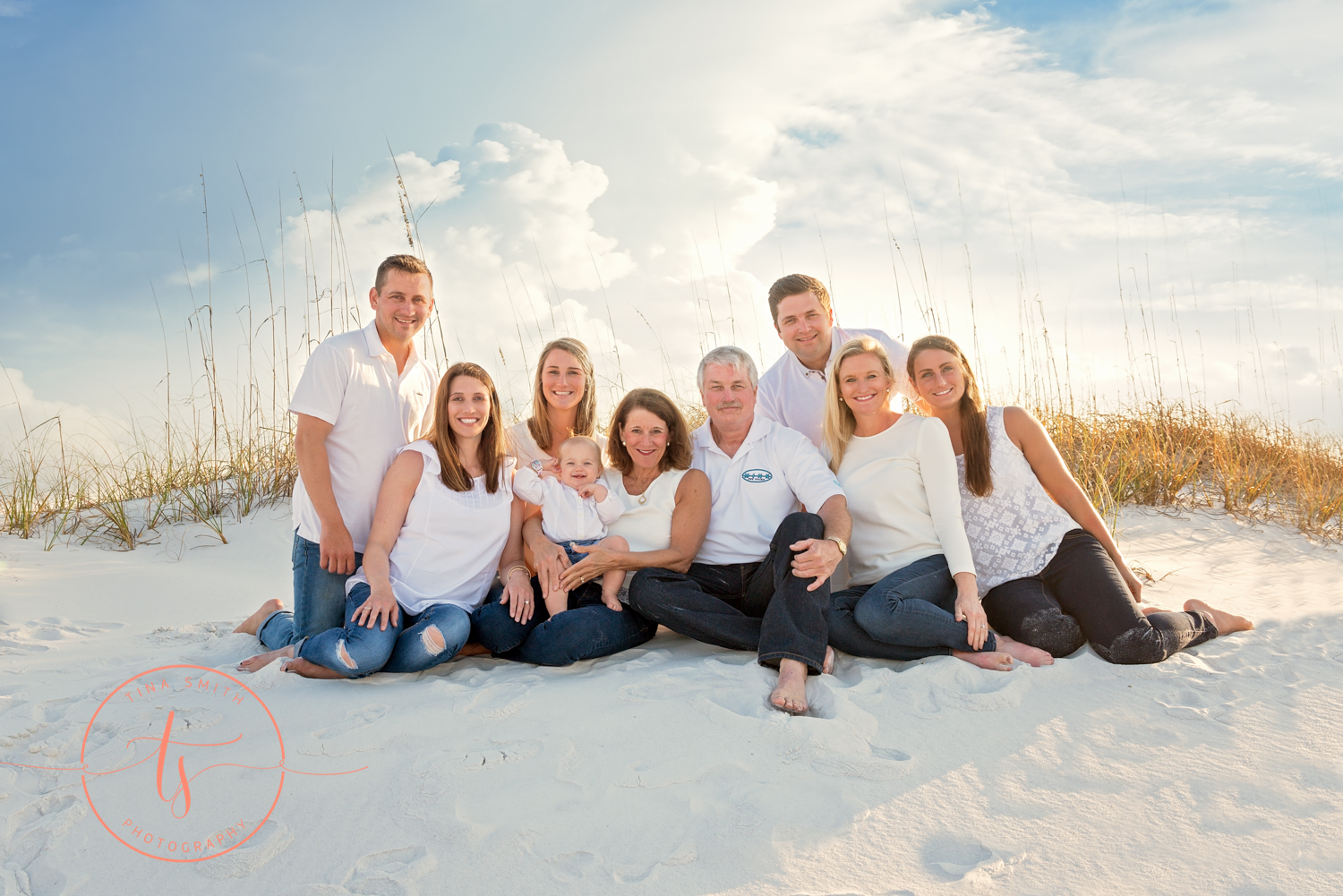 large family posing on beach in destin for photography