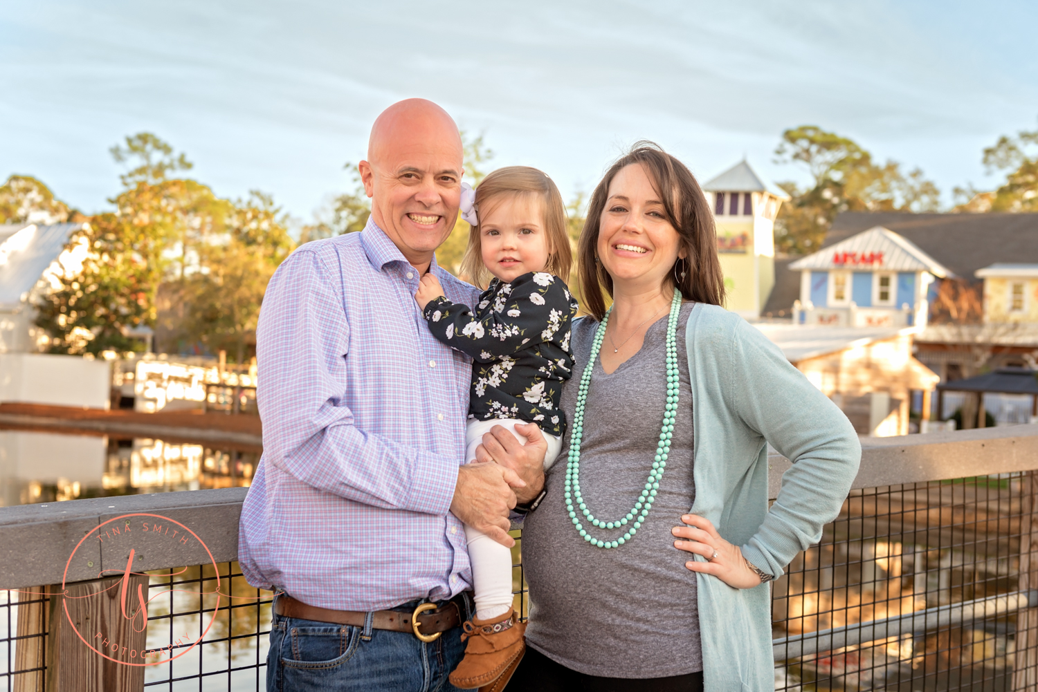 family standing on bridge bawytowne wharf 