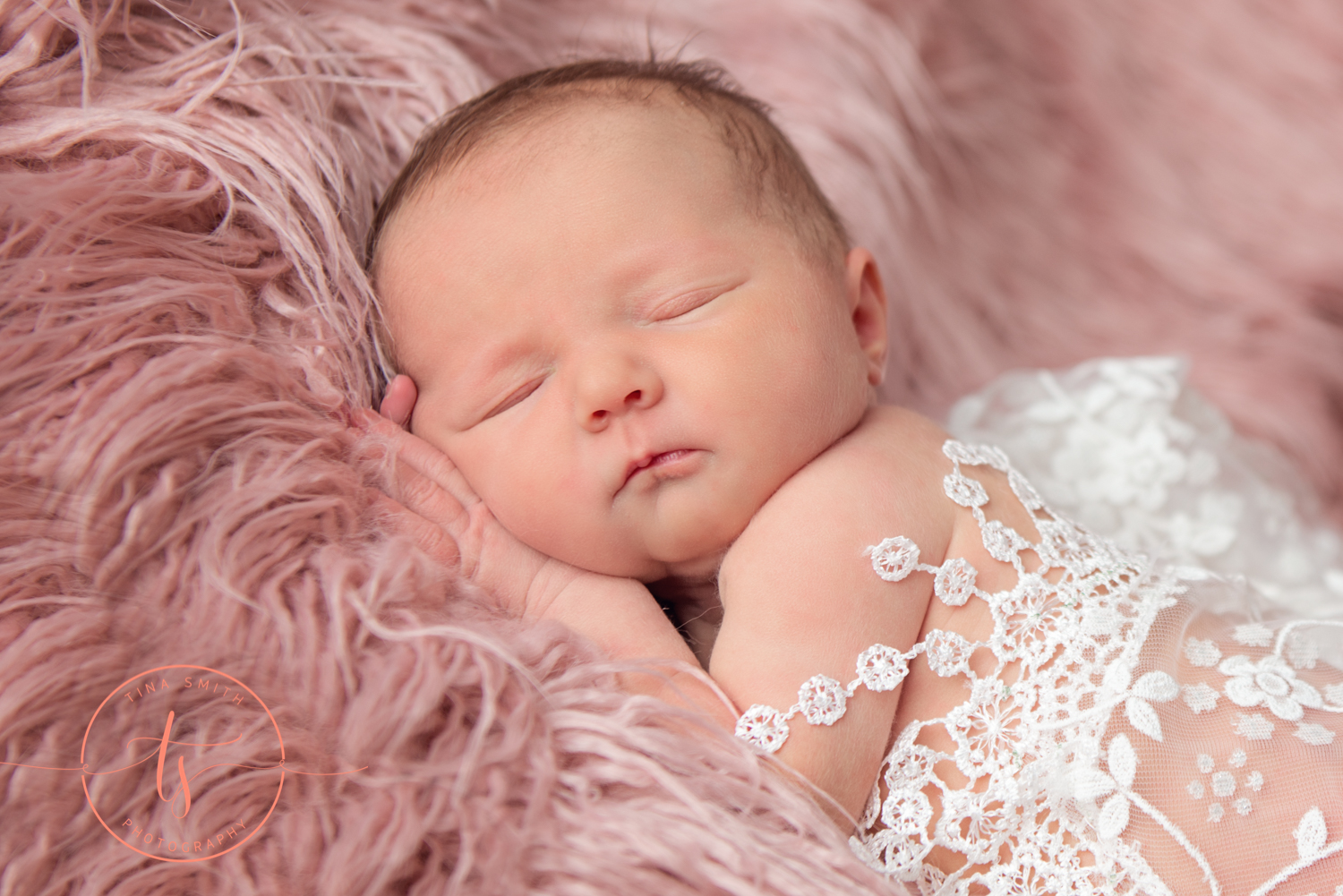 newborn baby photography pink fur white lace wrap