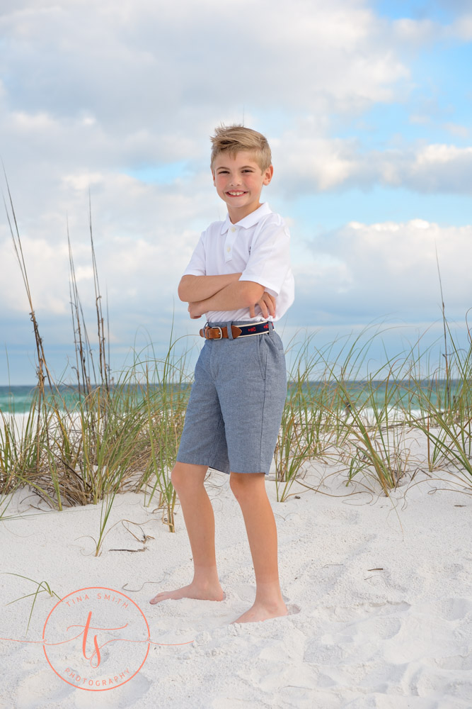 boy standing on beach in destin