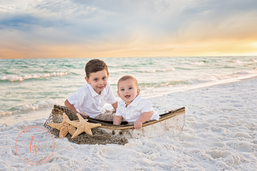 destin photographer two boys on beach in boat