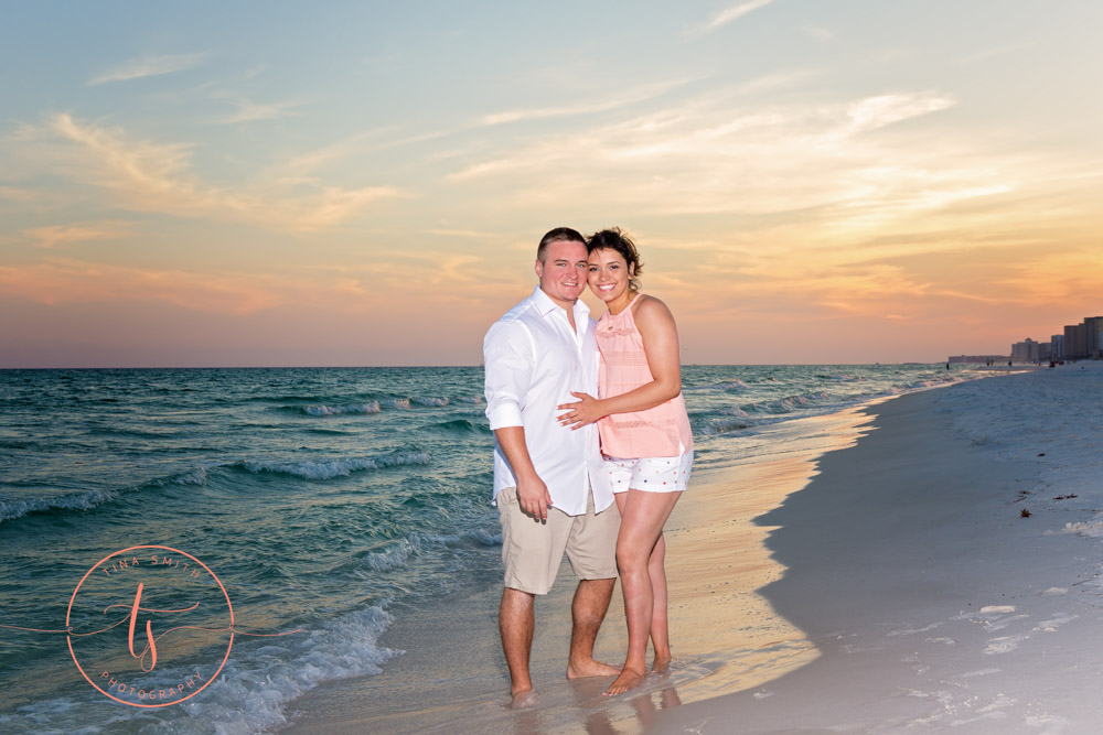 couple posing on beach for destin photographer