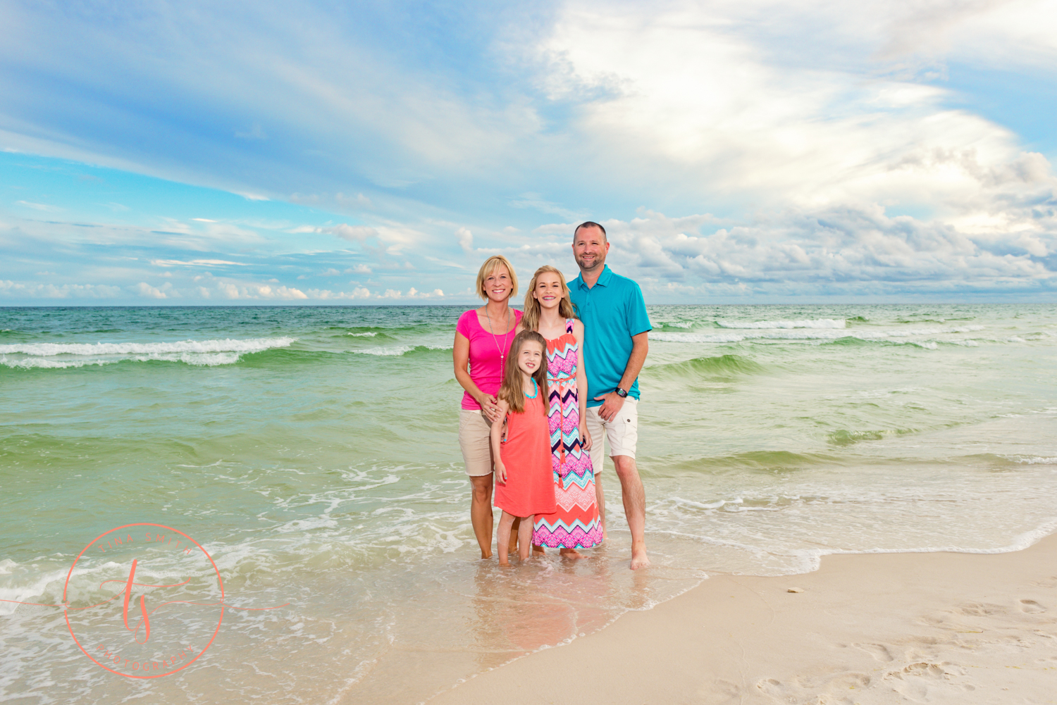 destin family beach photography posing in the waters edge