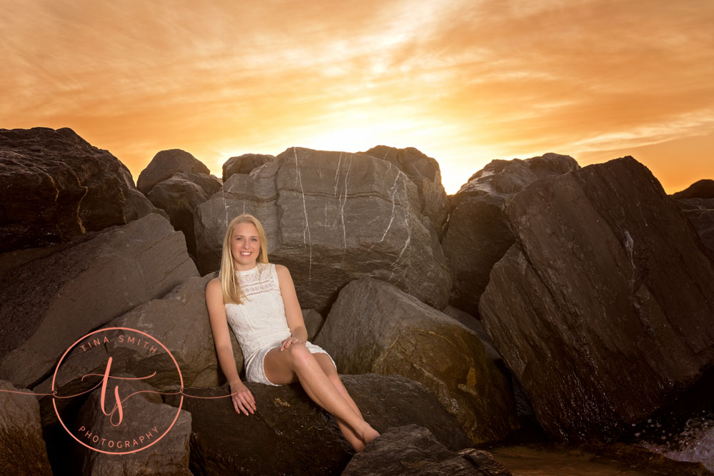 destin senior portraits girl posing on rocks