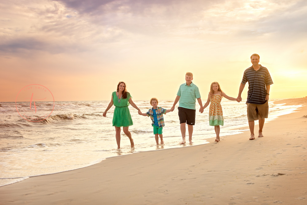 family walking on the beach rosemary beach photographer