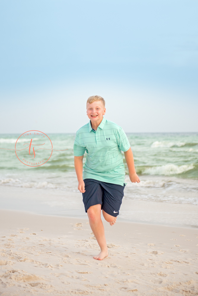 rosemary beach photographer boy running on the beach