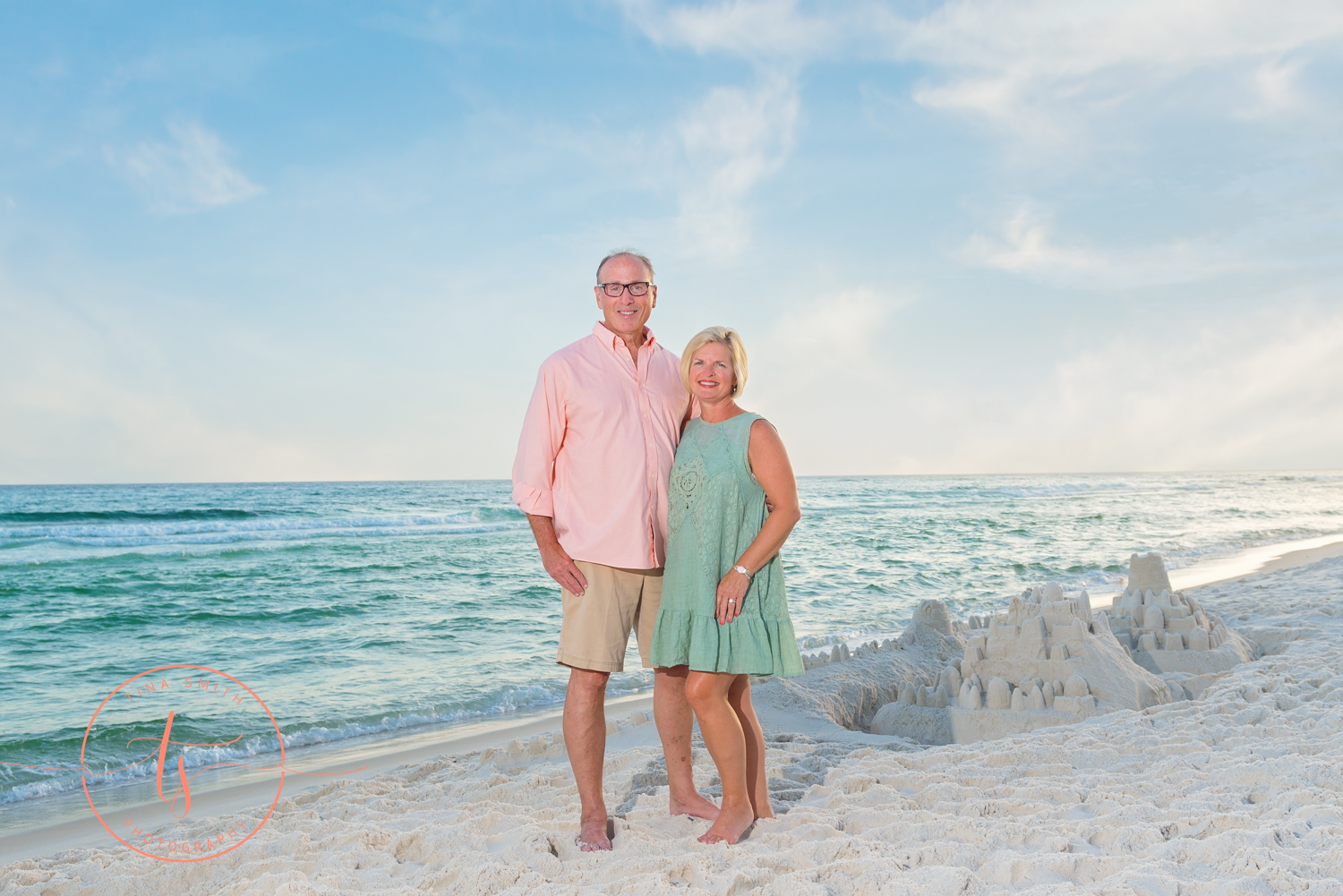 couple posing on the beach in seacrest for portraits