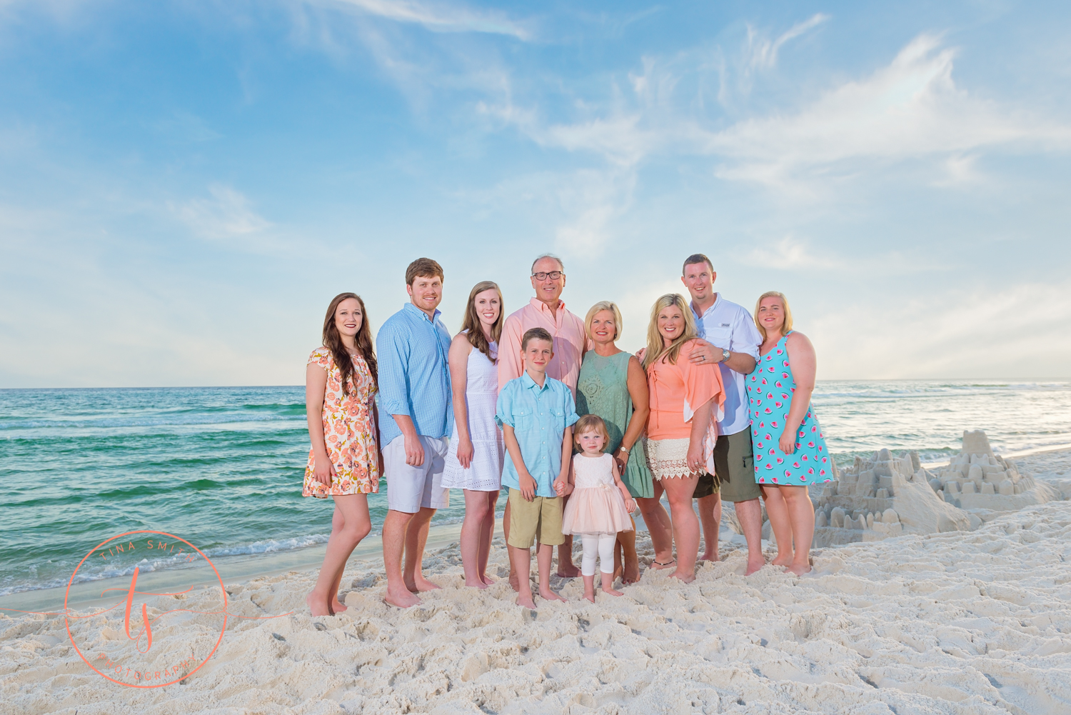 secrest family beach photography posing at waters edge